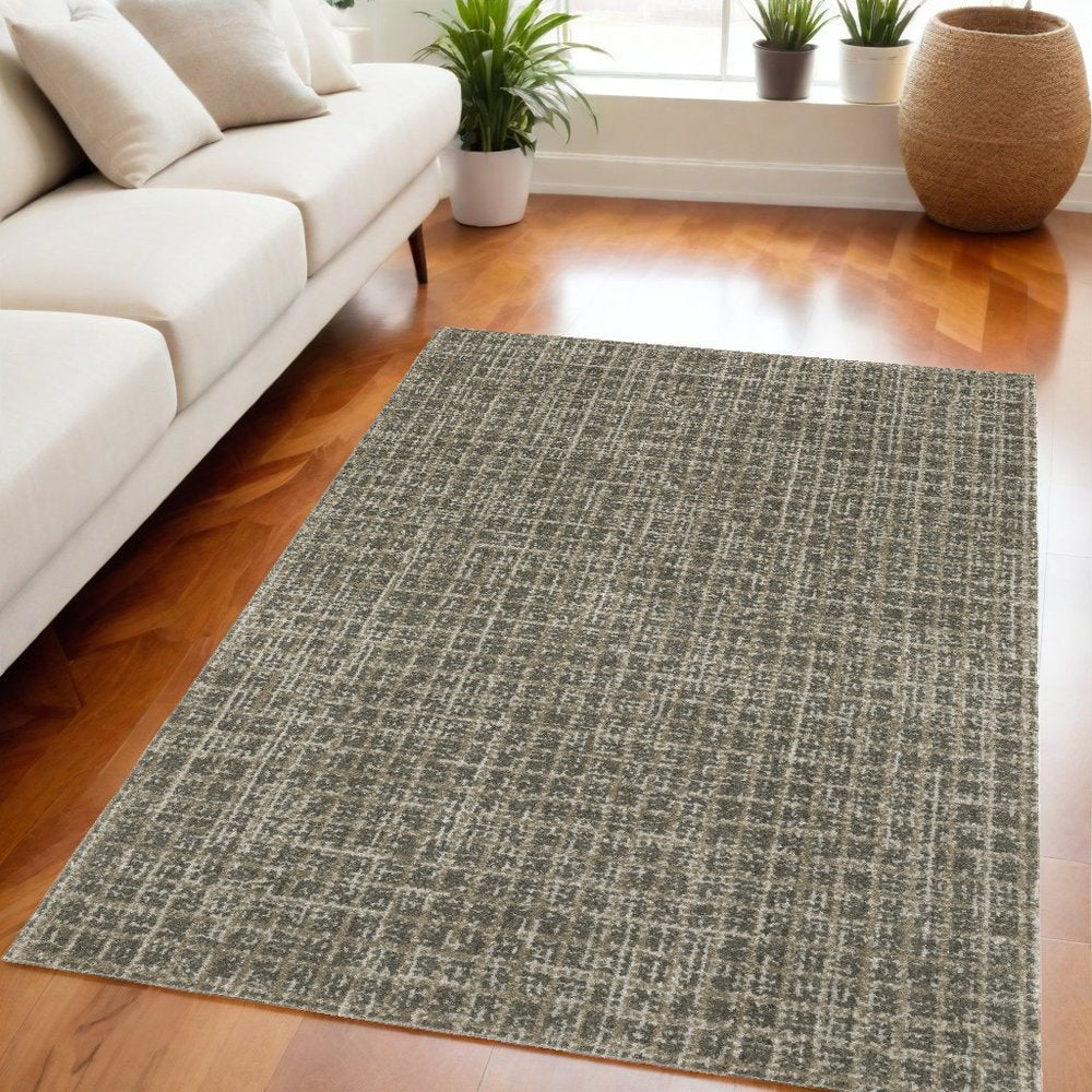5' X 8' Brown And Beige Geometric Distressed Area Rug