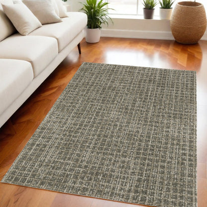 5' X 8' Brown And Beige Geometric Distressed Area Rug
