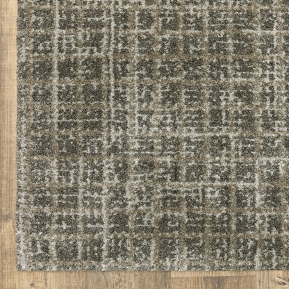 5' X 8' Brown And Beige Geometric Distressed Area Rug