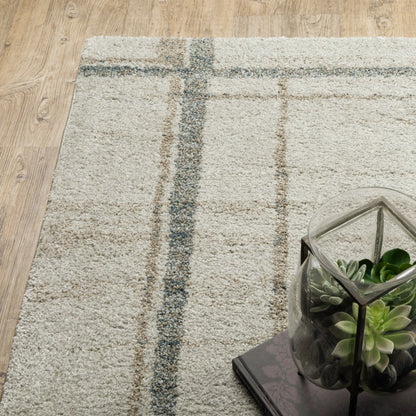 10' X 13' Grey Teal Beige and Tan Geometric Power Loom Area Rug