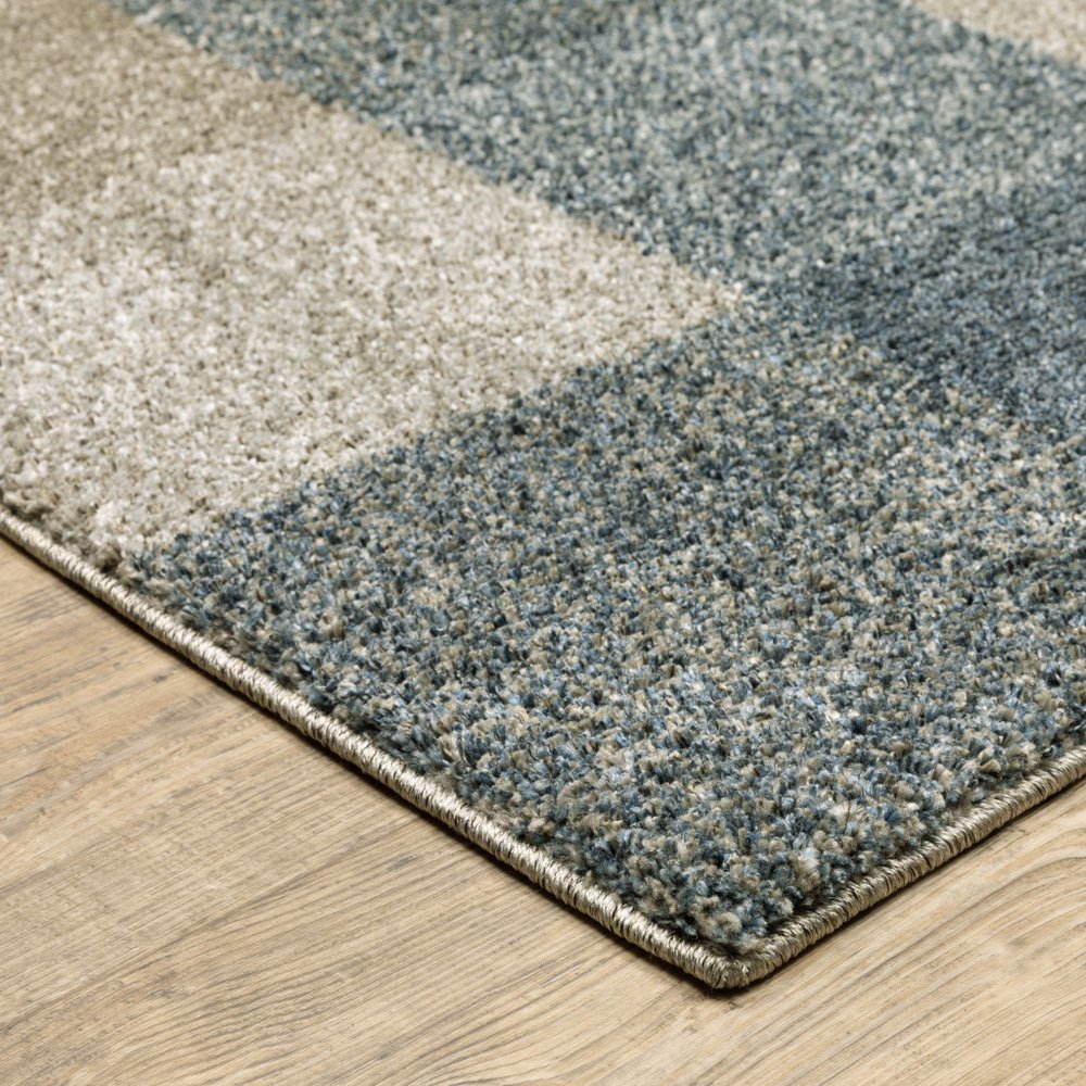 3' X 5' Blue And Beige Geometric Distressed Area Rug