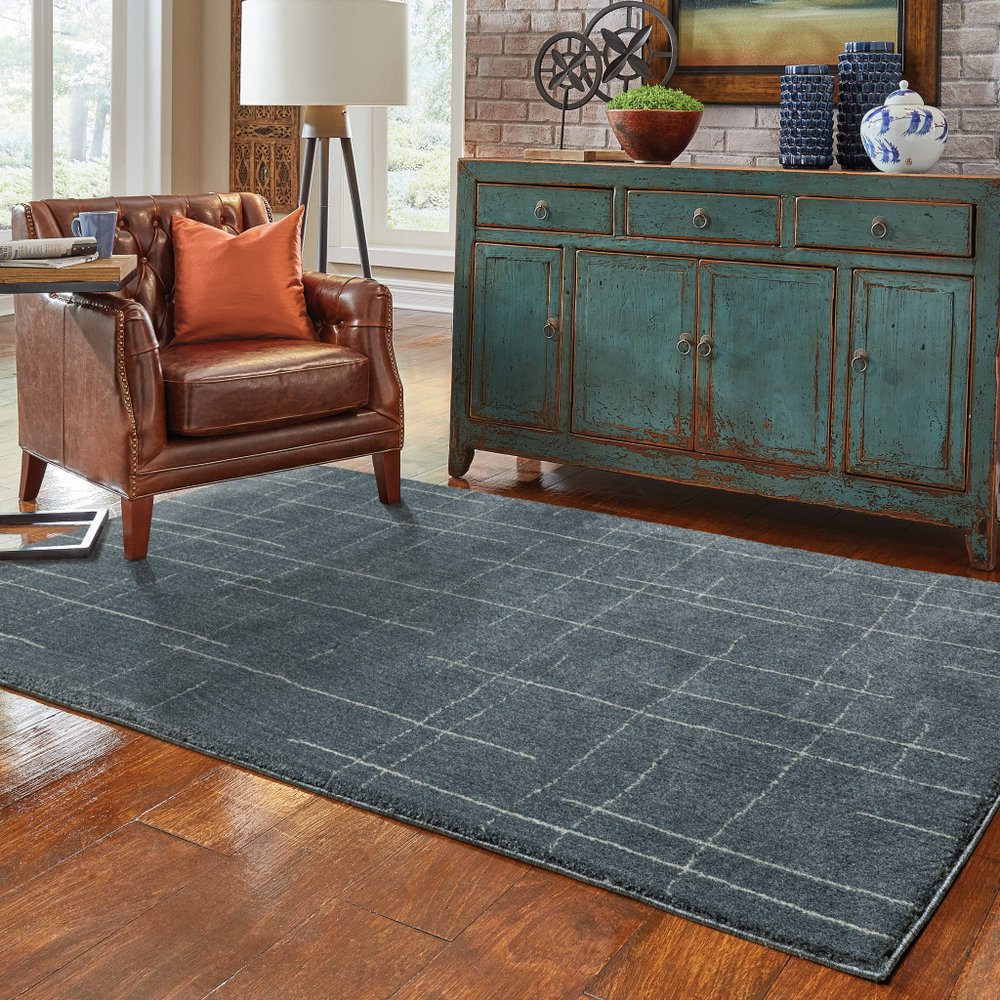 3' X 5' Blue And Beige Geometric Distressed Area Rug