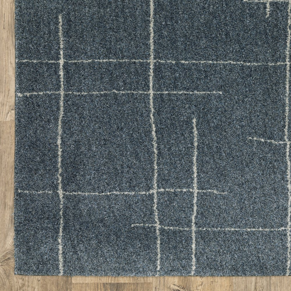 3' X 5' Blue And Beige Geometric Distressed Area Rug