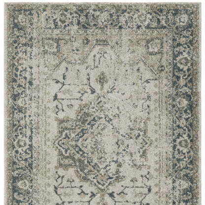 5' X 8' Beige And Blue Oriental Distressed Area Rug