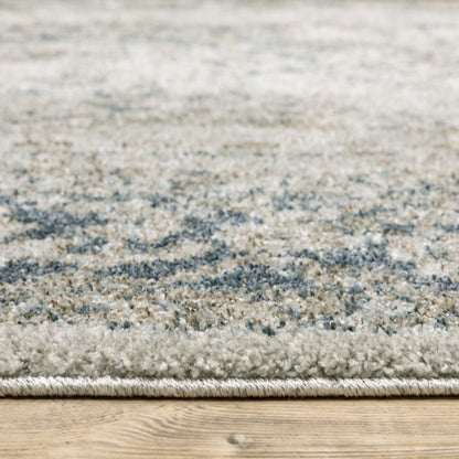 5' X 8' Beige And Blue Oriental Distressed Area Rug