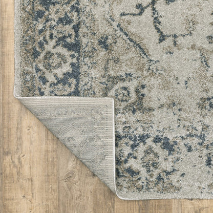 5' X 8' Beige And Blue Oriental Distressed Area Rug