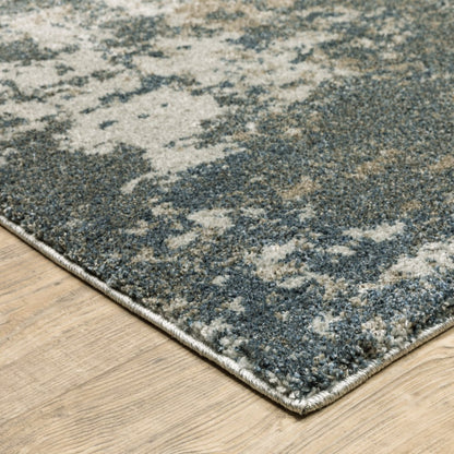 10' X 13' Blue And Beige Abstract Distressed Area Rug