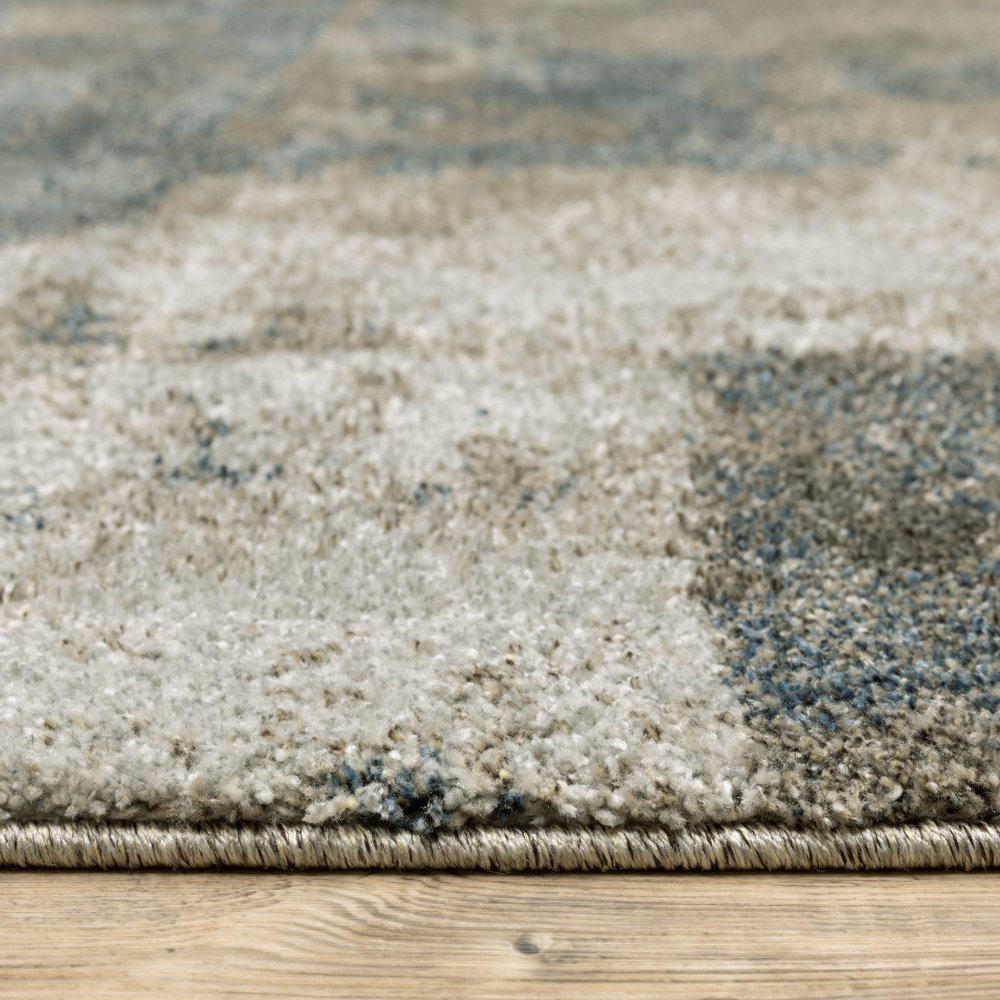 5' X 8' Teal Blue Geometric Power Loom Area Rug