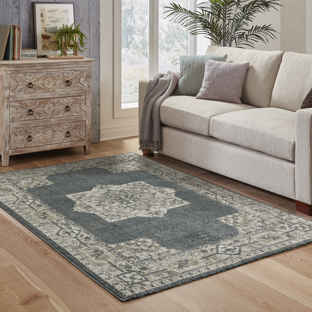 5' X 8' Blue and Beige Oriental Power Loom Area Rug