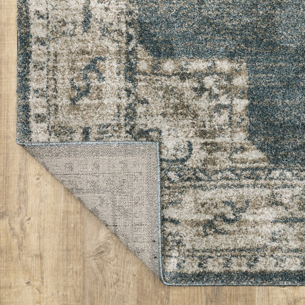 7' X 10' Blue and Beige Oriental Power Loom Area Rug