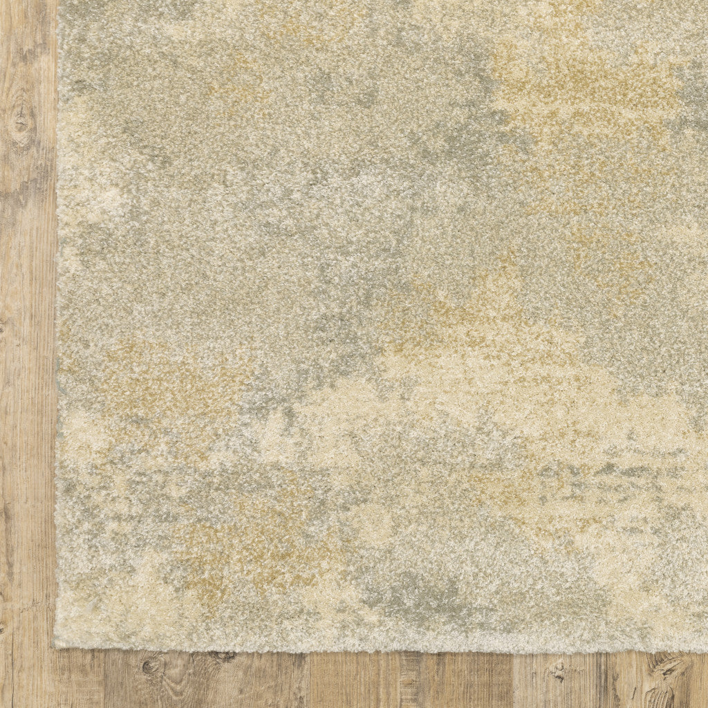 5' X 8' Grey Ivory Beige And Taupe Abstract Power Loom Stain Resistant Area Rug