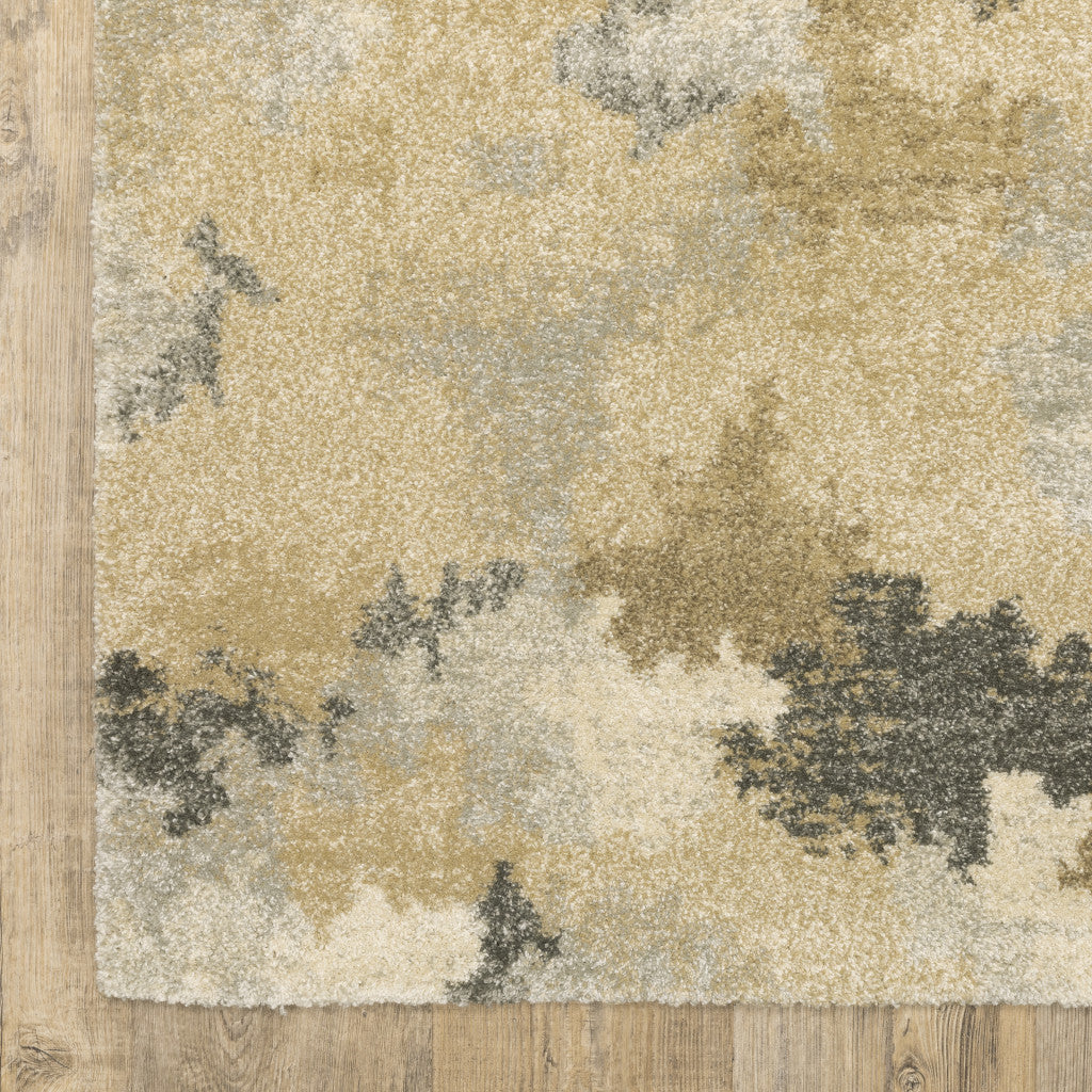 3' X 5' Beige Grey And Gold Abstract Power Loom Stain Resistant Area Rug