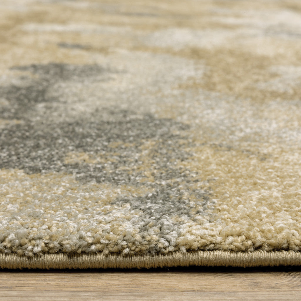 5' X 8' Beige Grey And Gold Abstract Power Loom Stain Resistant Area Rug