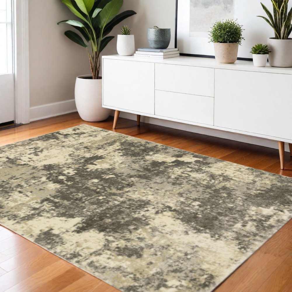 3' X 5' Charcoal Grey Beige And Tan Abstract Power Loom Stain Resistant Area Rug