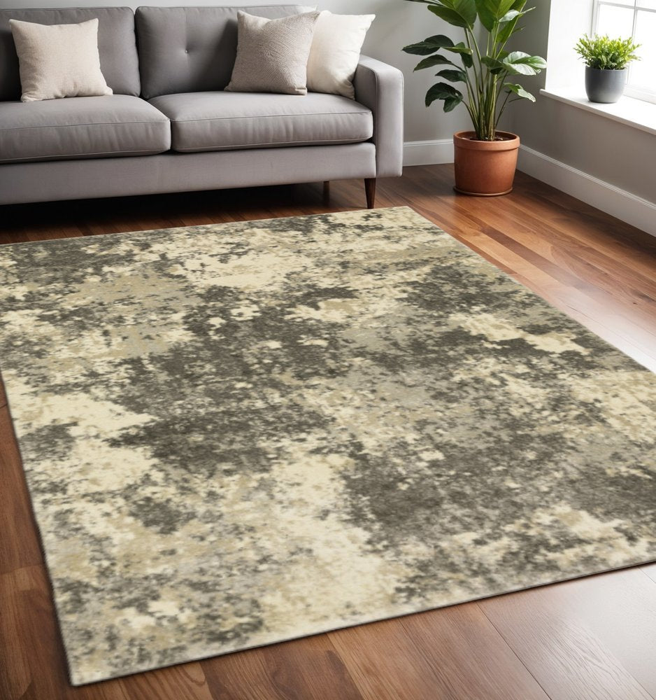 5' X 8' Charcoal Grey Beige And Tan Abstract Power Loom Stain Resistant Area Rug