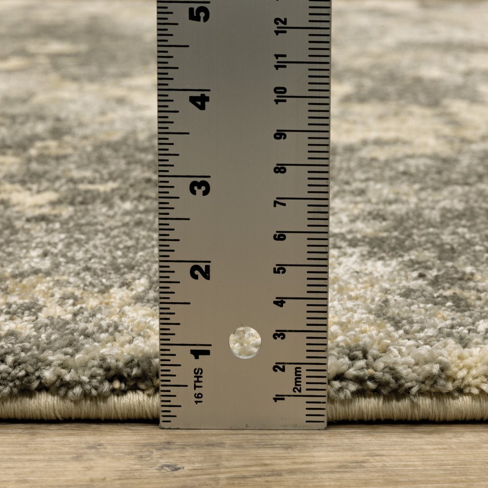 7' X 10' Gray And Beige Abstract Area Rug