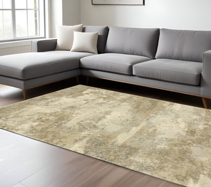 8' X 11' Beige and Gold Abstract Power Loom Area Rug