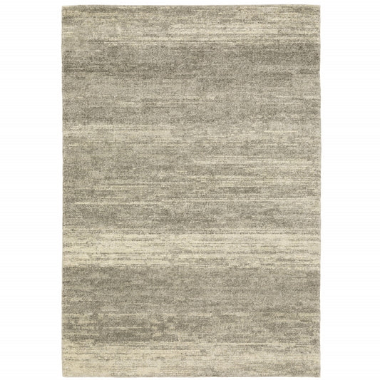 3' X 5' Grey Beige And Tan Abstract Power Loom Stain Resistant Area Rug