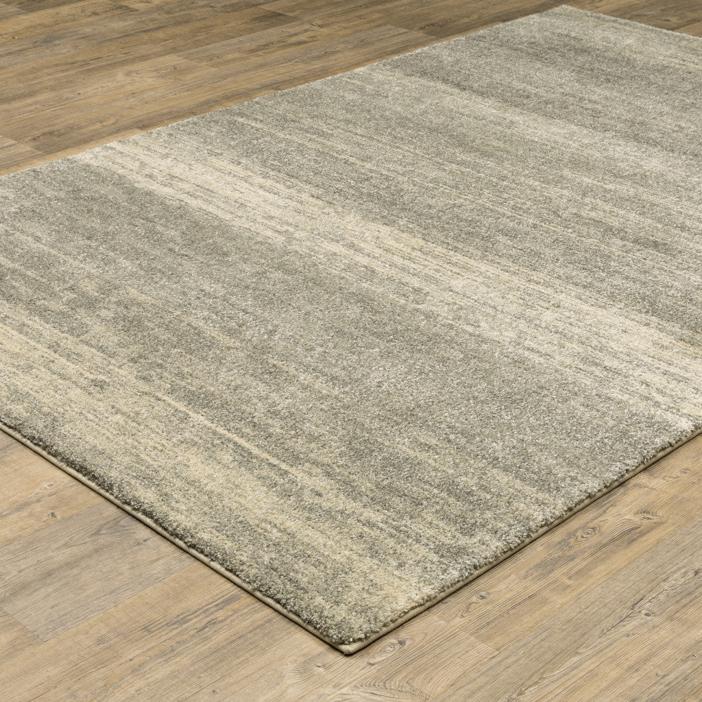 3' X 5' Grey Beige And Tan Abstract Power Loom Stain Resistant Area Rug