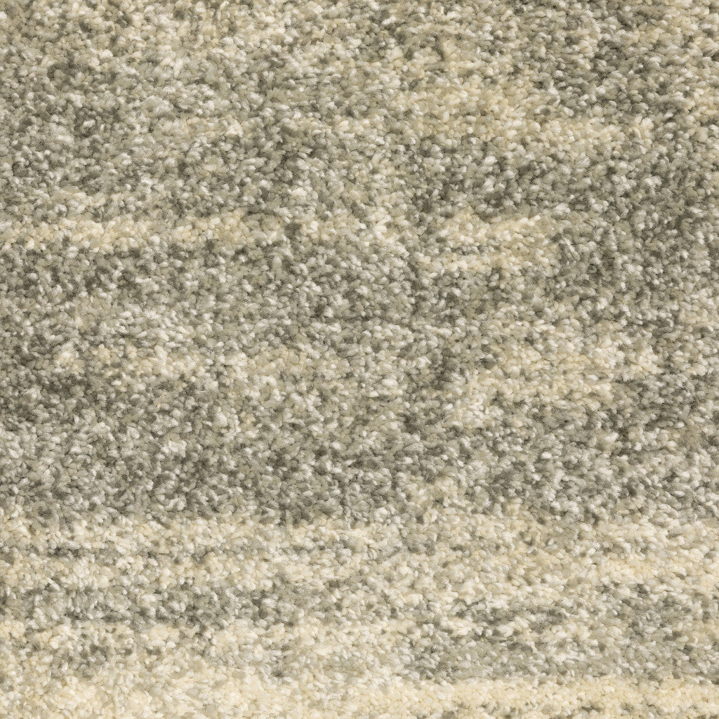 3' X 5' Grey Beige And Tan Abstract Power Loom Stain Resistant Area Rug