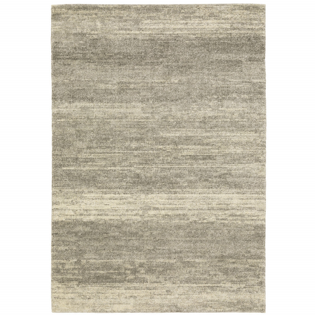 6' X 9' Grey Beige And Tan Abstract Power Loom Stain Resistant Area Rug