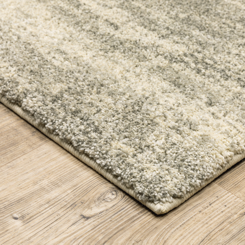 8' X 11' Grey Beige And Tan Abstract Power Loom Stain Resistant Area Rug