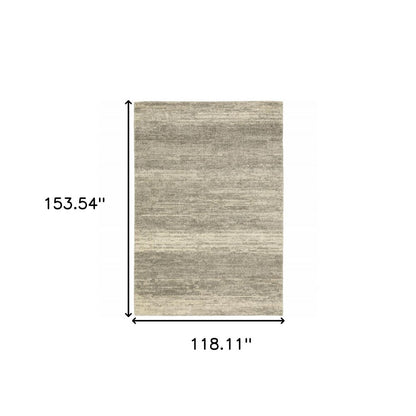 10' X 13' Grey Beige And Tan Abstract Power Loom Stain Resistant Area Rug
