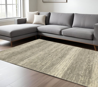 10' X 13' Grey Beige And Tan Abstract Power Loom Stain Resistant Area Rug