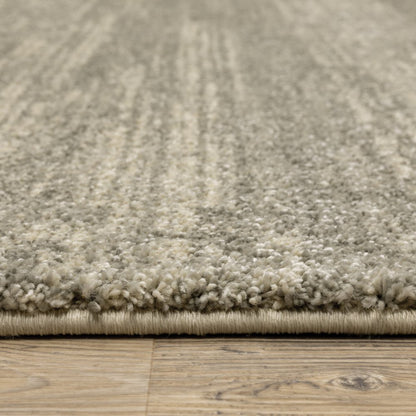10' X 13' Grey Beige And Tan Abstract Power Loom Stain Resistant Area Rug