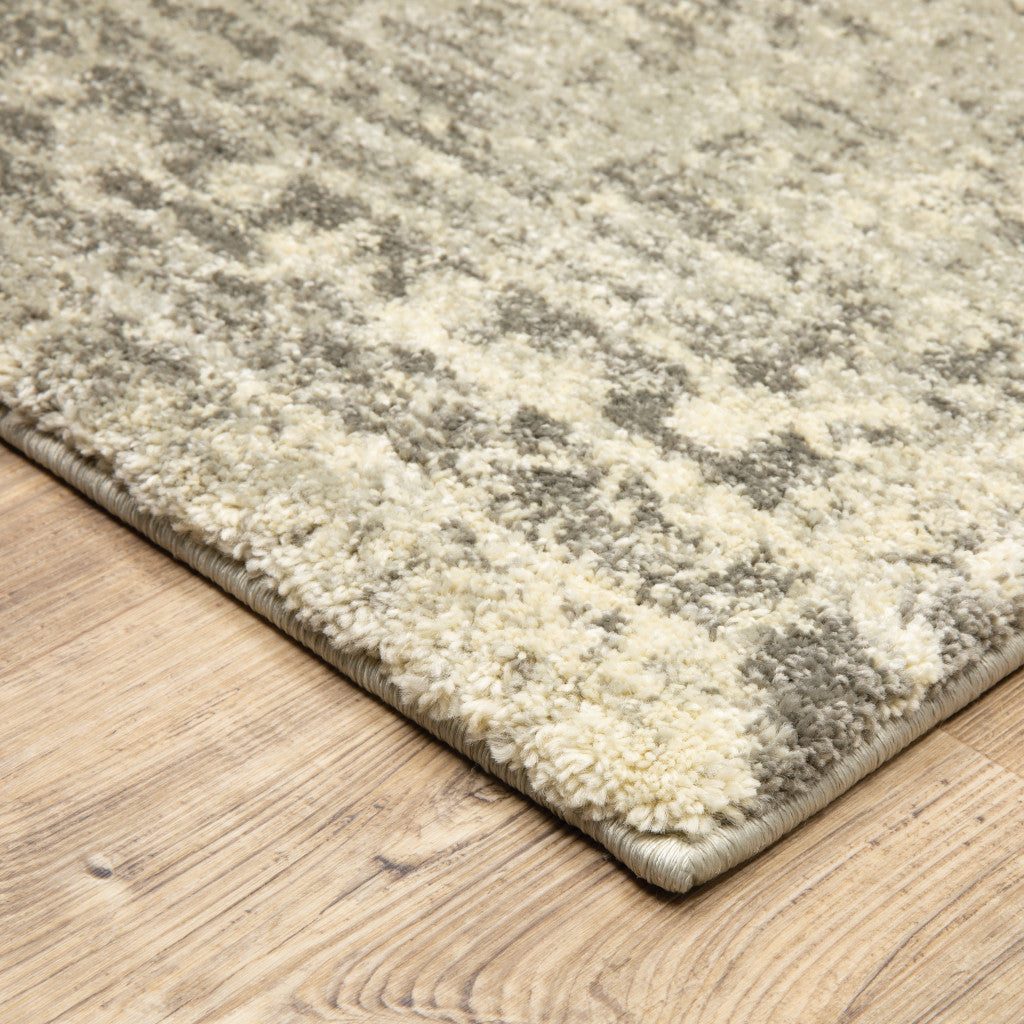 3' X 5' Grey Ivory Beige And Taupe Oriental Power Loom Stain Resistant Area Rug