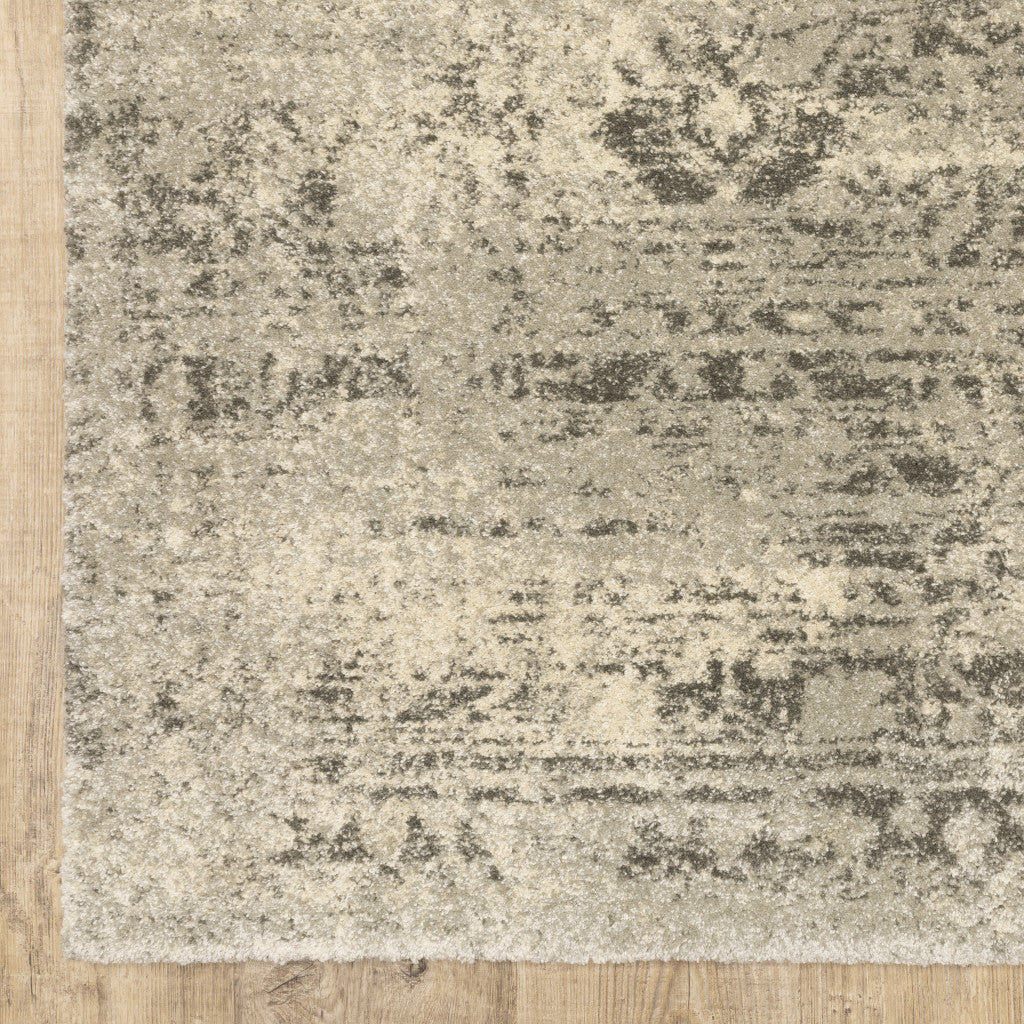 3' X 5' Grey Ivory Beige And Taupe Oriental Power Loom Stain Resistant Area Rug