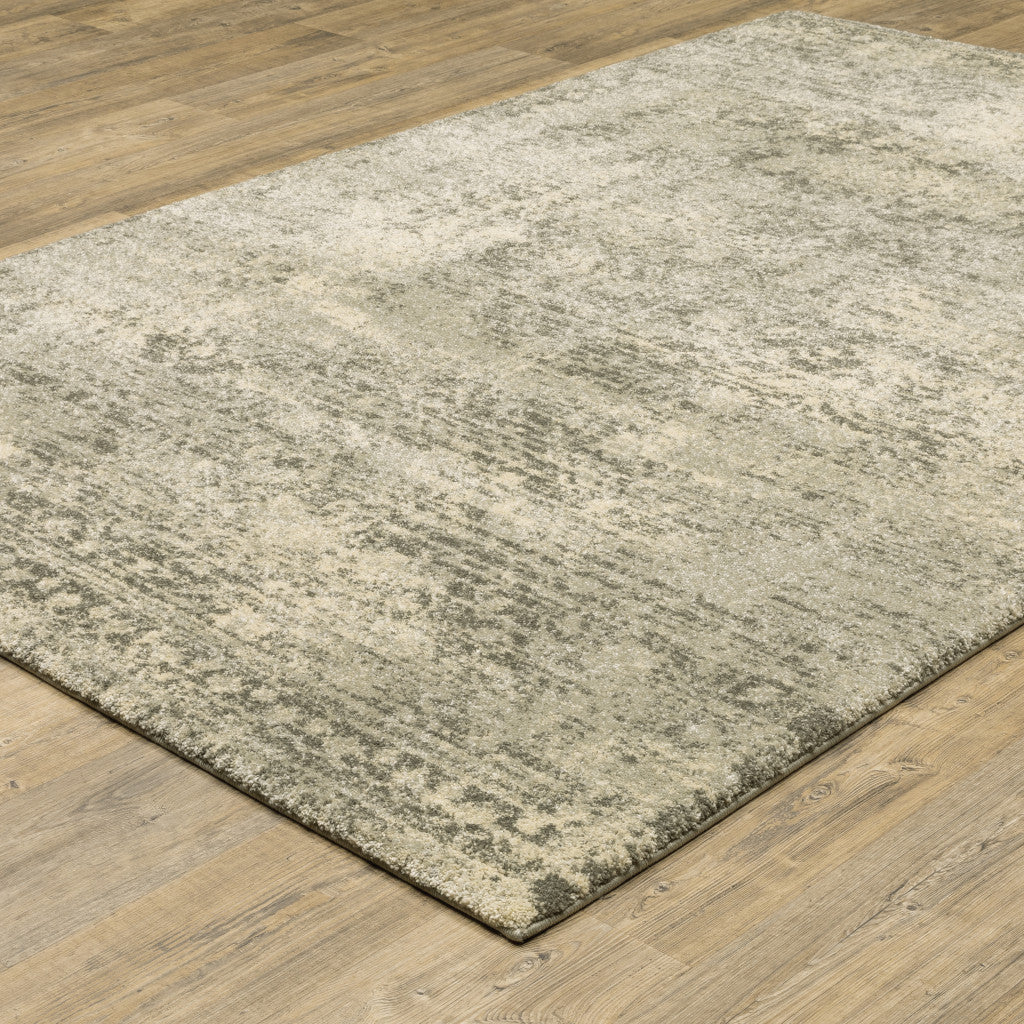 5' X 8' Grey Ivory Beige And Taupe Oriental Power Loom Stain Resistant Area Rug