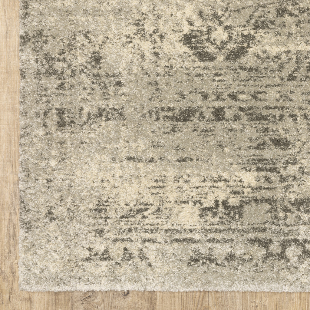 5' X 8' Grey Ivory Beige And Taupe Oriental Power Loom Stain Resistant Area Rug