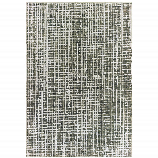 4' X 6' Grey And Ivory Abstract Power Loom Stain Resistant Area Rug