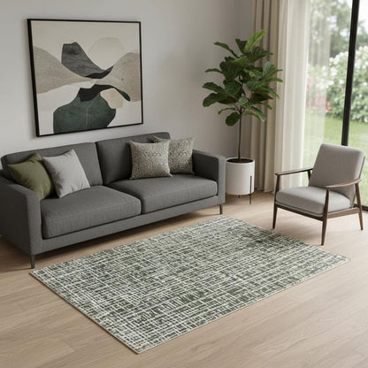 5' X 8' Grey And Ivory Abstract Power Loom Stain Resistant Area Rug