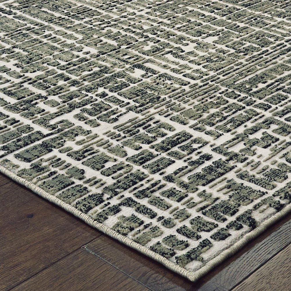 7' X 10' Gray And Ivory Abstract Area Rug
