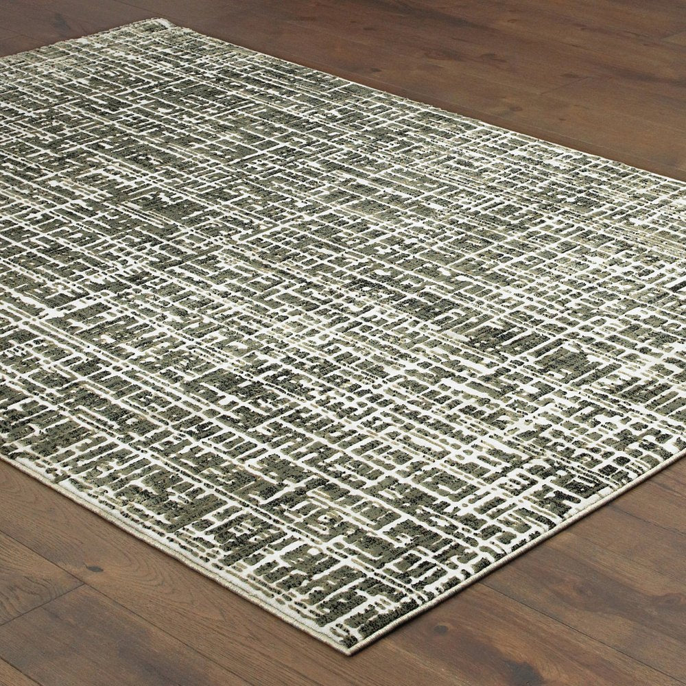 7' X 10' Gray And Ivory Abstract Area Rug