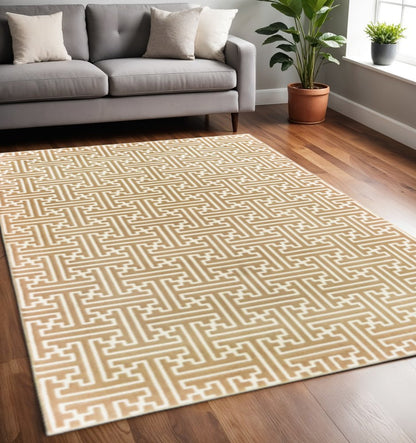 5' X 8' Gold And Ivory Geometric Power Loom Stain Resistant Area Rug