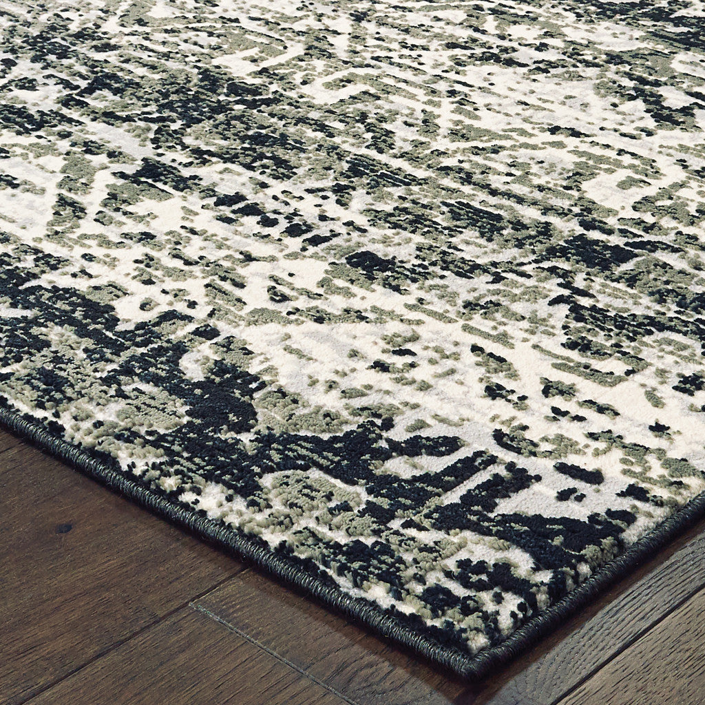 8' X 11' Grey And Ivory Geometric Power Loom Stain Resistant Area Rug