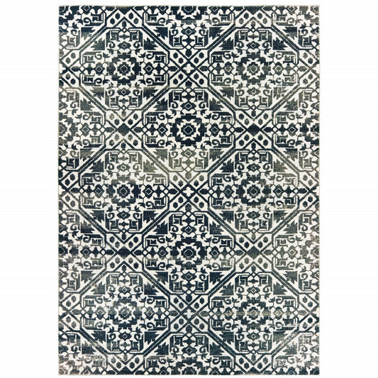 5' X 8' Navy And Ivory Geometric Power Loom Stain Resistant Area Rug