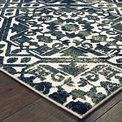 7' X 10' Navy Blue And Ivory Geometric Distressed Area Rug