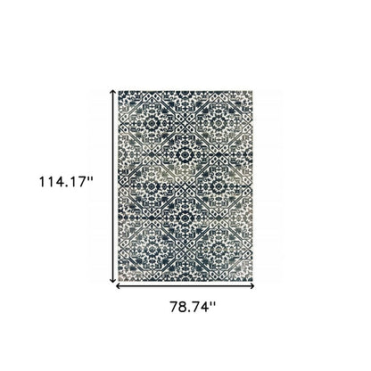 7' X 10' Navy Blue And Ivory Geometric Distressed Area Rug