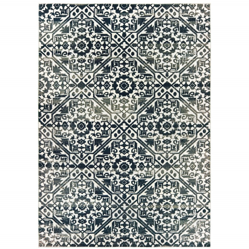 8' X 11' Navy Blue And Ivory Geometric Distressed Area Rug