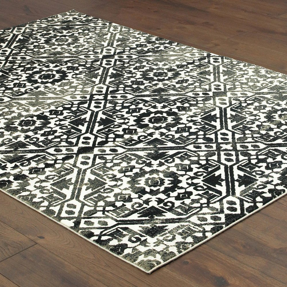 8' X 11' Navy Blue And Ivory Geometric Distressed Area Rug