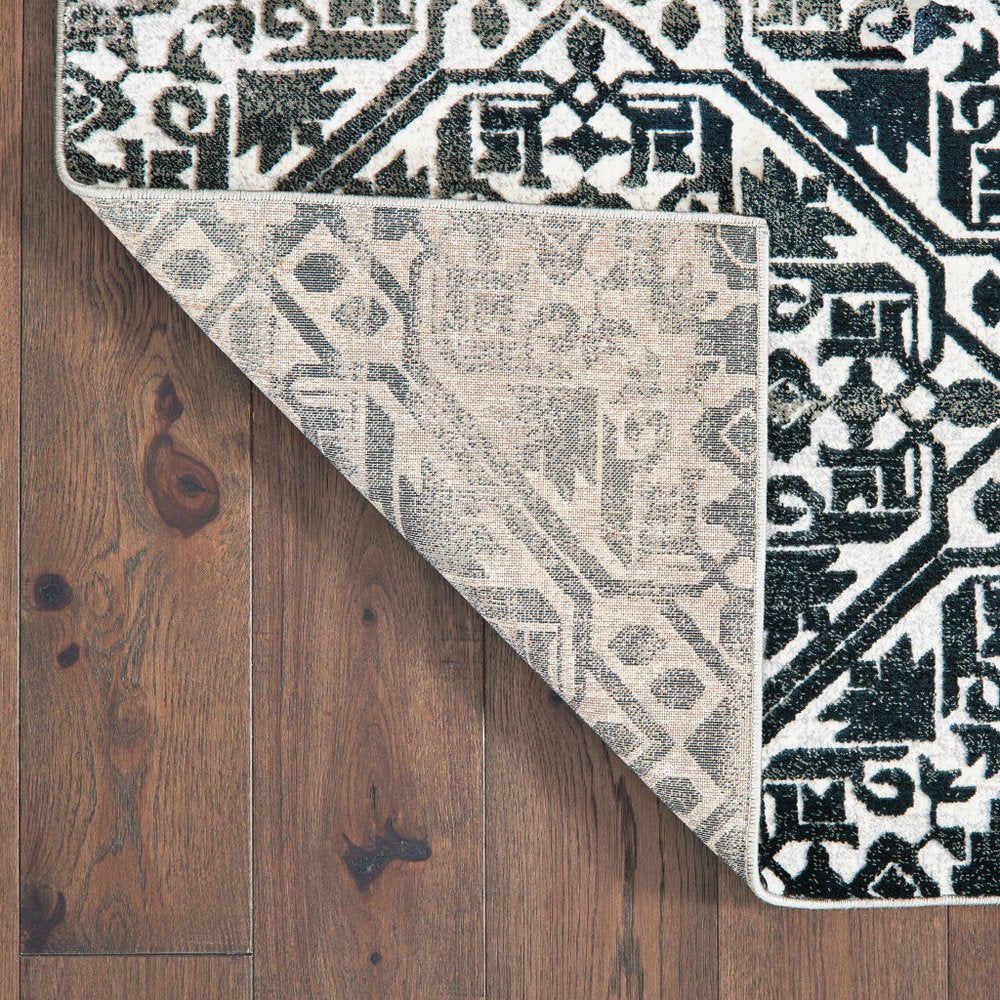8' X 11' Navy Blue And Ivory Geometric Distressed Area Rug