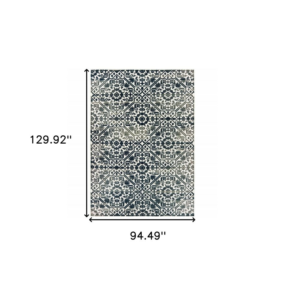 8' X 11' Navy Blue And Ivory Geometric Distressed Area Rug