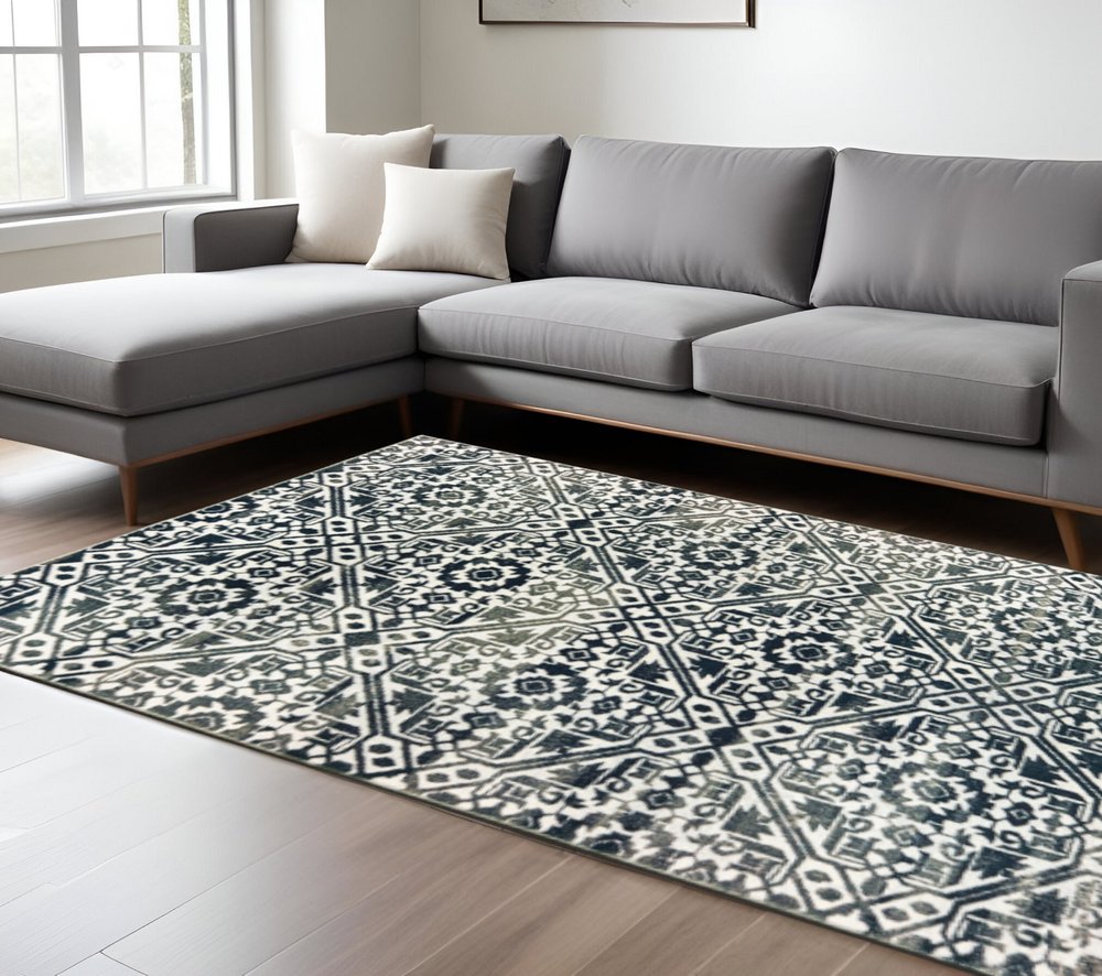 10' X 13' Navy And Ivory Geometric Power Loom Stain Resistant Area Rug