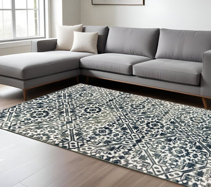 10' X 13' Navy And Ivory Geometric Power Loom Stain Resistant Area Rug