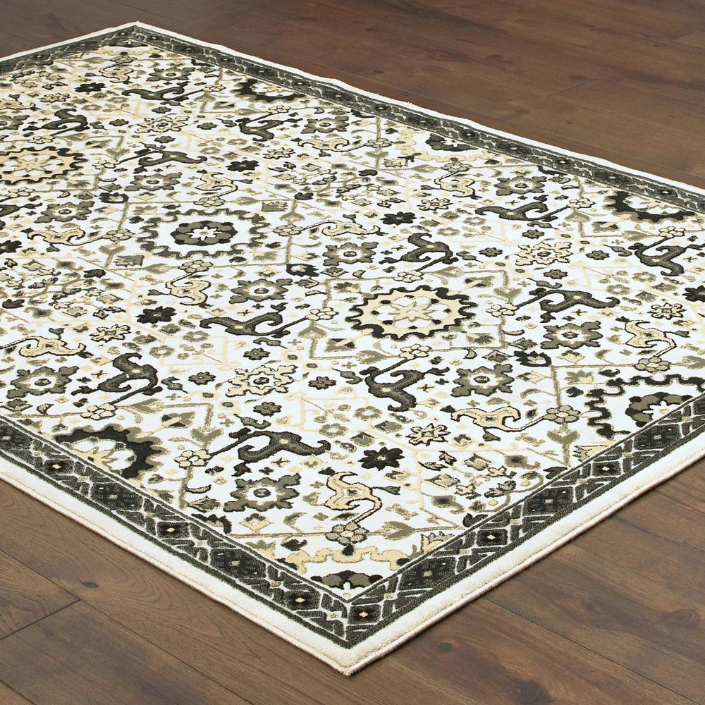 7' X 10' Ivory And Navy Blue Oriental Area Rug