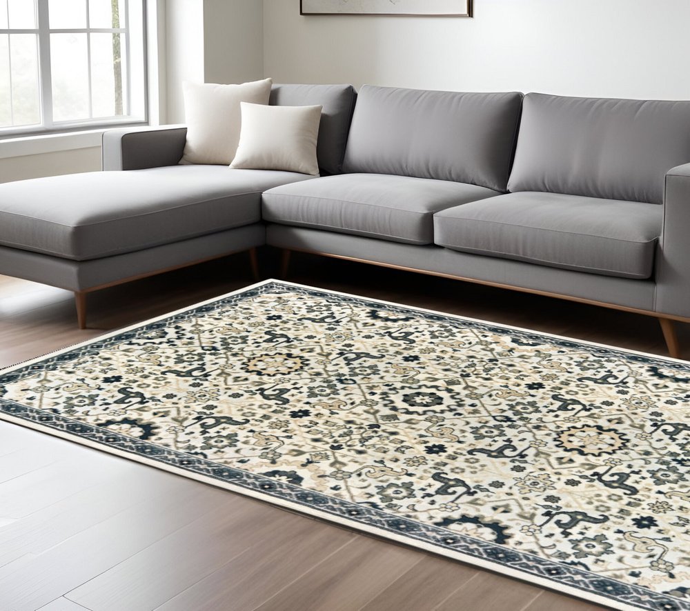 7' X 10' Ivory And Navy Blue Oriental Area Rug